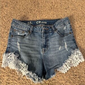 CP Jeans jean shorts size 7 with white pattern on the bottom